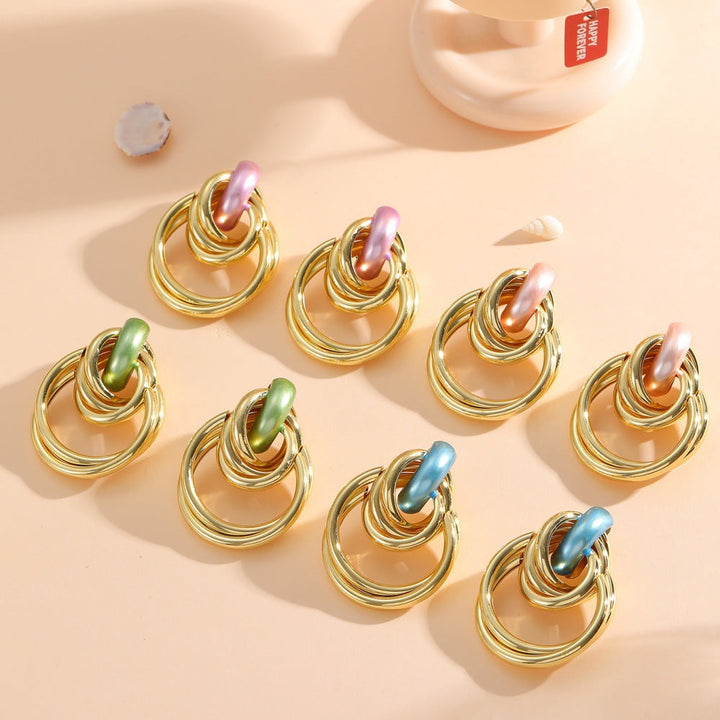 Women's Hanging Earrings with Elegant, Sculptural Design Tom Cottons