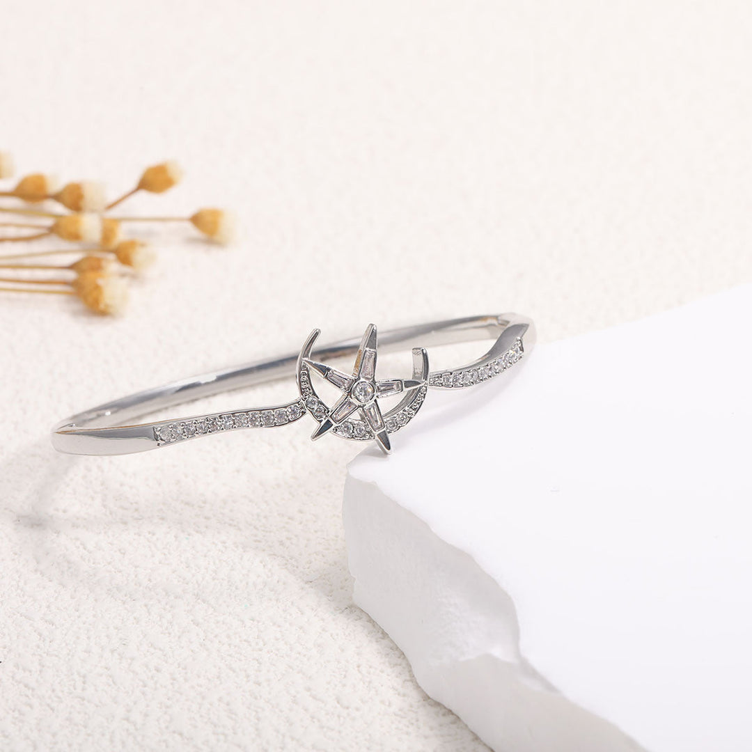 Women's bangle with elegant infinity pattern and sparkling zirconia Tom Cottons