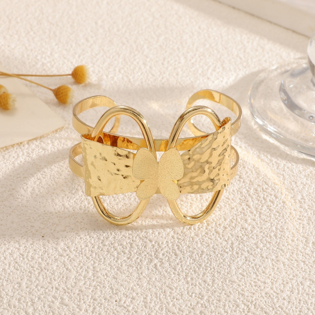Women's bracelet with ornate butterfly design Tom Cottons