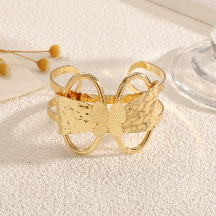 Women's bracelet with ornate butterfly design Tom Cottons