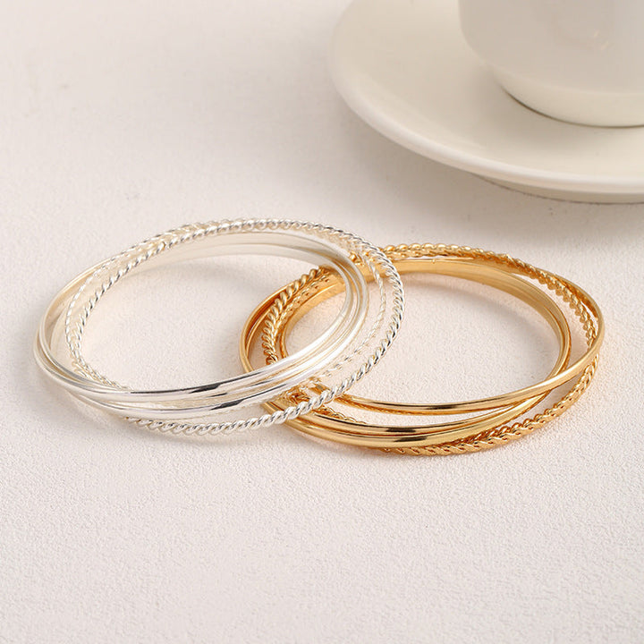 Women's bangle set with elaborate, braided and simple designs Tom Cottons