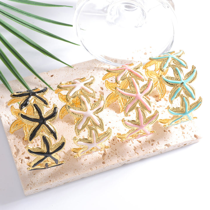 Ladies Open Cuff Bracelet with Expressive Star Motif Tom Cottons