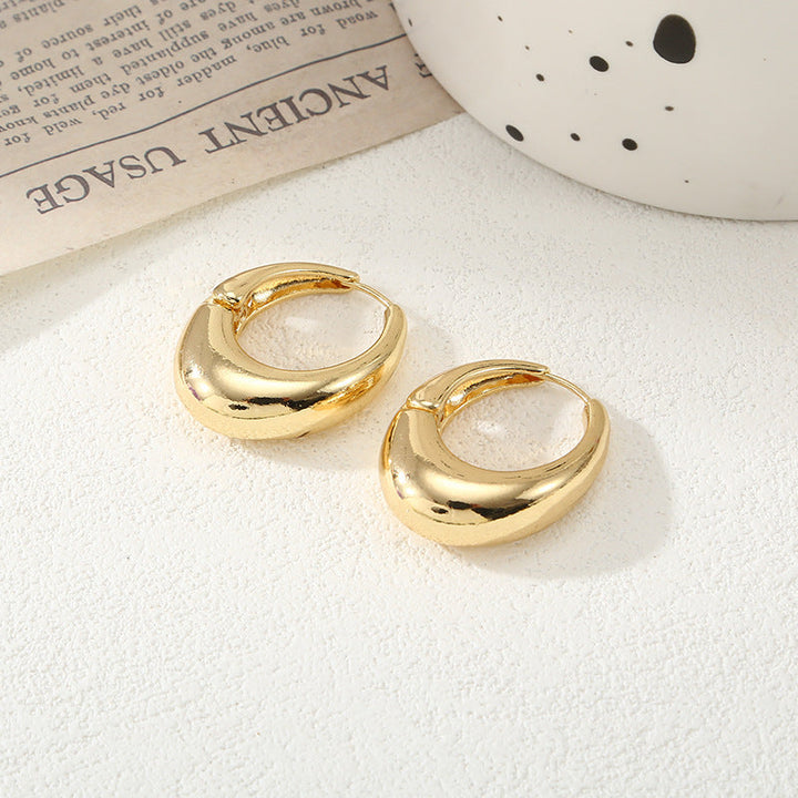 Women's Hoop Earrings with Elegant Curved Design Tom Cottons