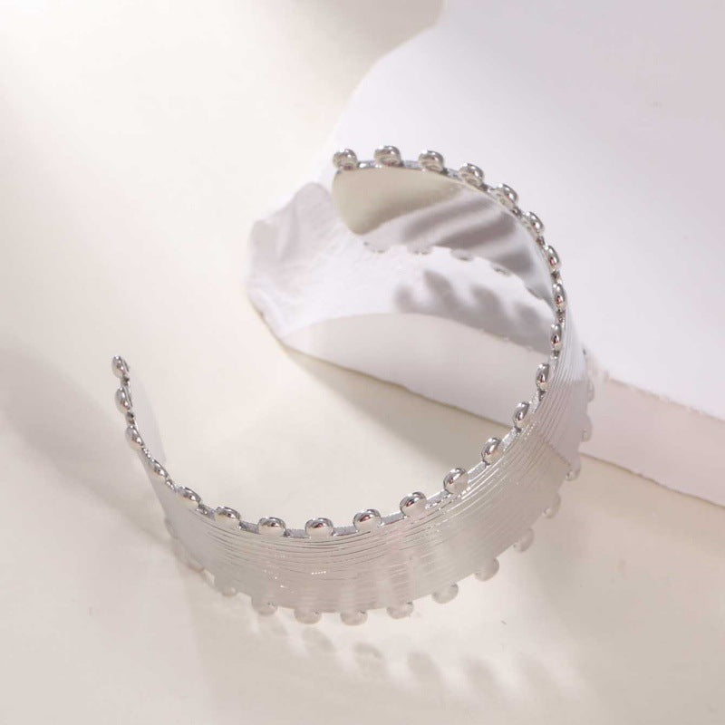 Women's Open Bangle with Elegant Wave Design Tom Cottons