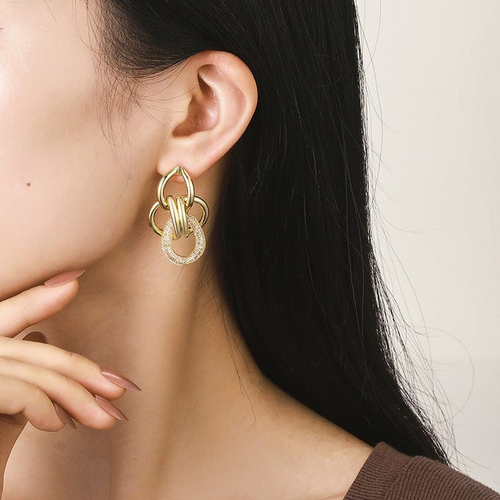 Women's Hanging Earrings with Luxurious, Sculptural Design Tom Cottons