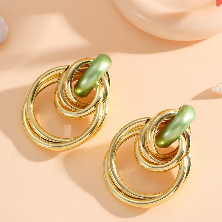 Women's Hanging Earrings with Elegant, Sculptural Design Tom Cottons