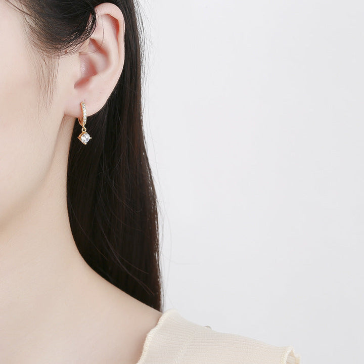 Ladies earrings with sparkling crystals and high-quality gold plating Tom Cottons