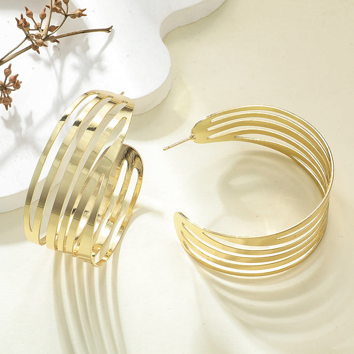 Women's Hanging Earrings in Elegant Wave Pattern Tom Cottons