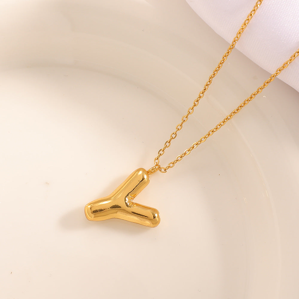 Women's necklace with curved letter pendant Tom Cottons