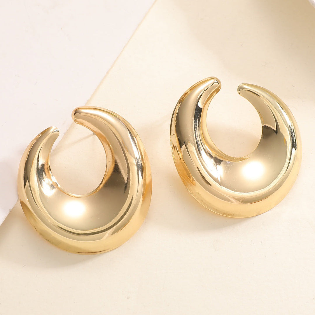 Women's earrings with elegant curved design Tom Cottons