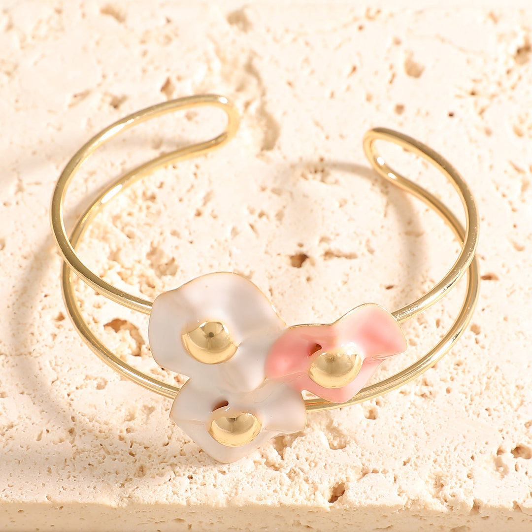 Women's bangle with elaborate floral design Tom Cottons