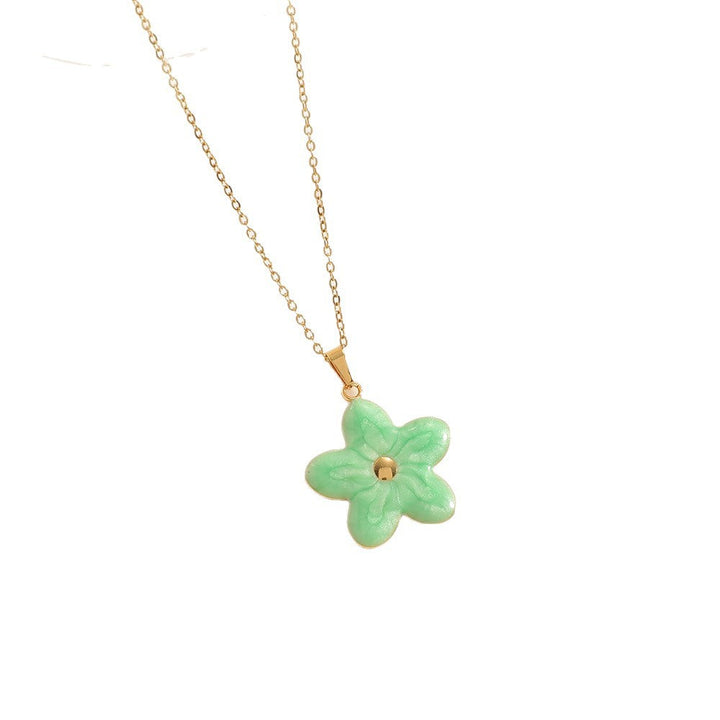 Women’s necklace with elaborately designed flower pendant Tom Cottons