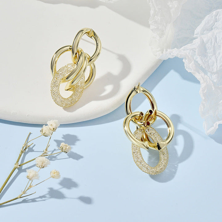 Women's Hanging Earrings with Luxurious, Sculptural Design Tom Cottons