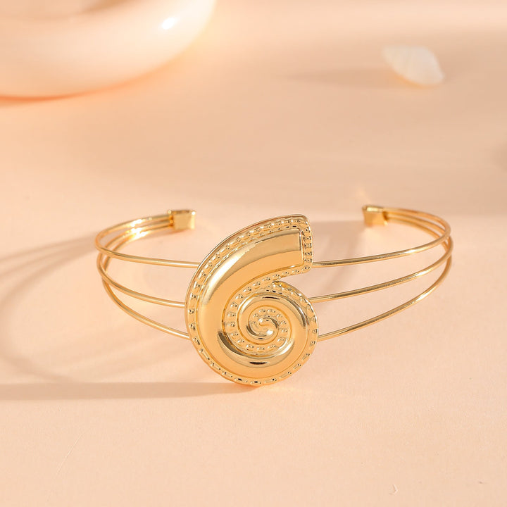 Women's bracelet with intricate bow design Tom Cottons
