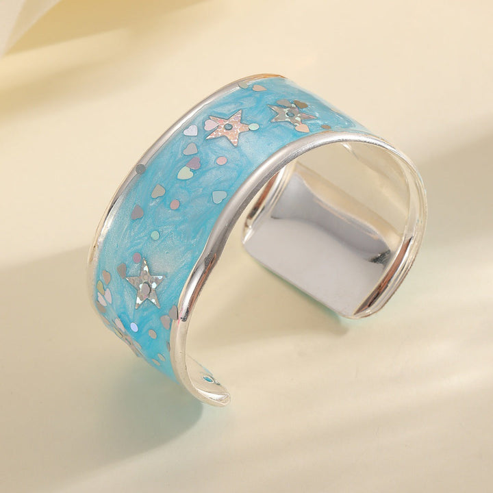 Women's bangle with sparkling star motif Tom Cottons