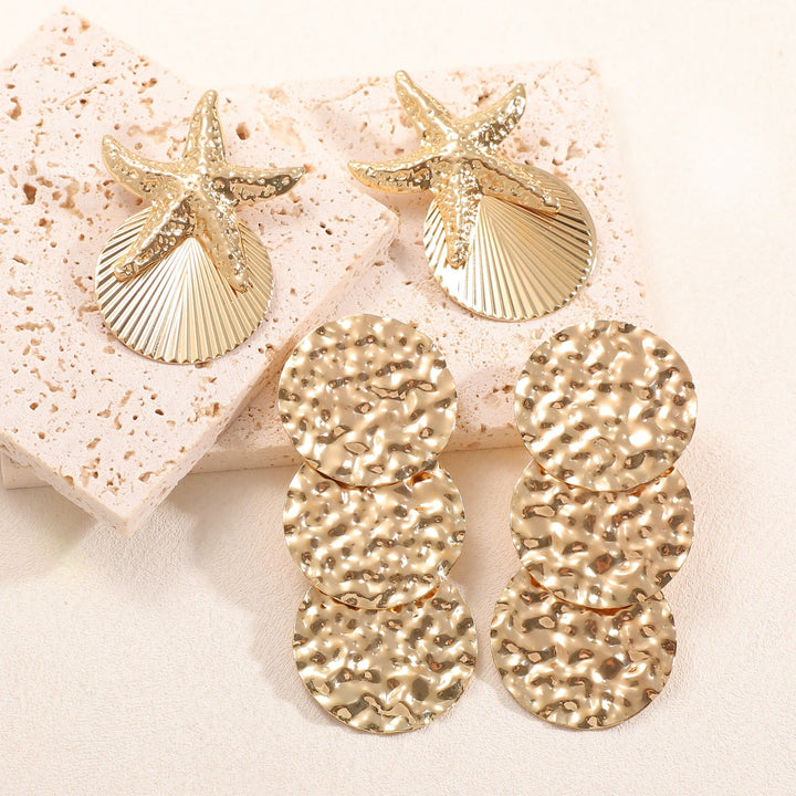 Women's ear clips in luxurious shell and starfish design Tom Cottons