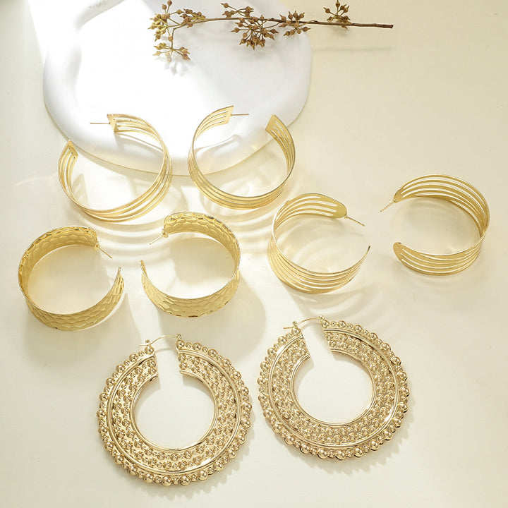 Women's Hanging Earrings in Elegant Wave Pattern Tom Cottons