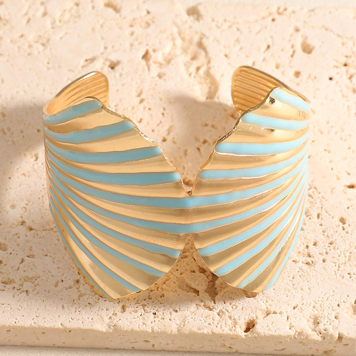 Women's bangle with elegant shell design Tom Cottons