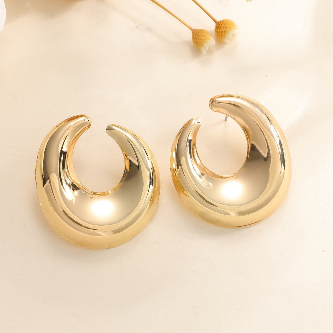 Women's earrings with elegant curved design Tom Cottons