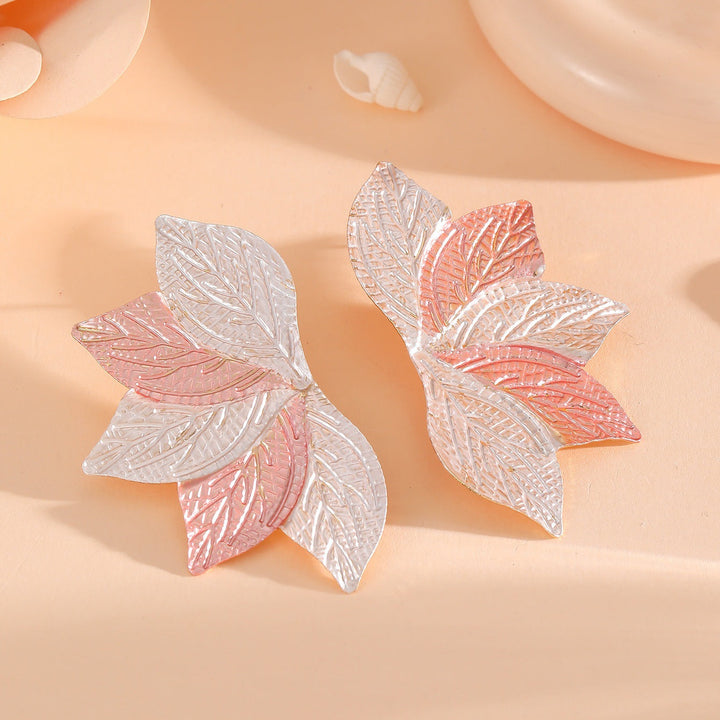 Women’s hair accessory with elaborate leaf design Tom Cottons