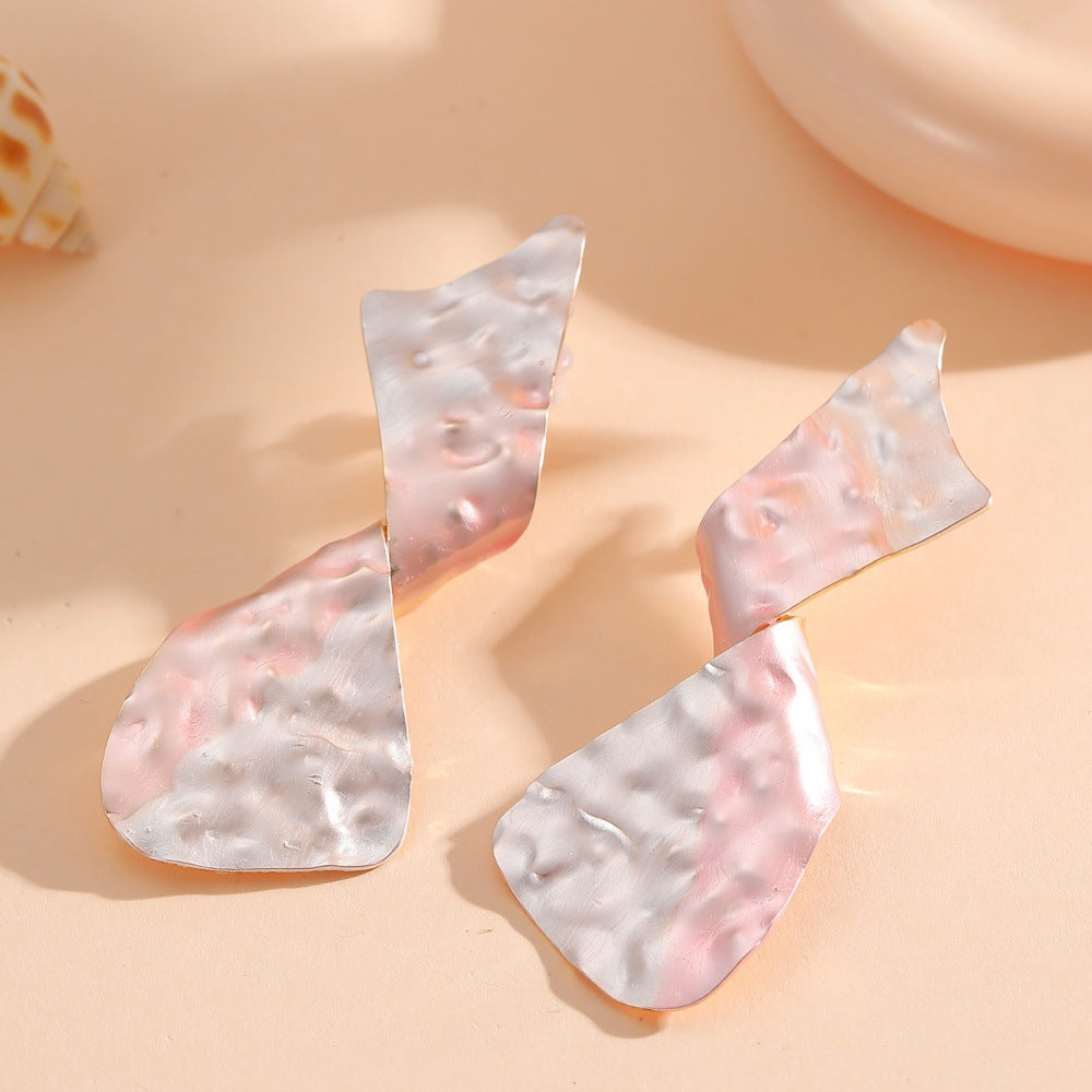 Ladies earrings in modern disc design Tom Cottons