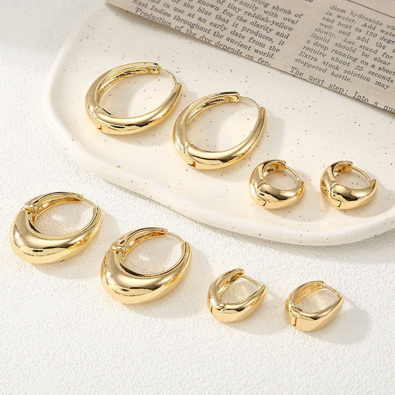 Women's Hoop Earrings with Elegant Curved Design Tom Cottons
