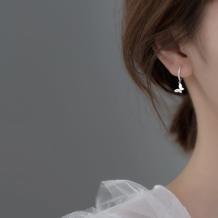 Ladies earrings with elegant butterfly design and sparkling details Tom Cottons