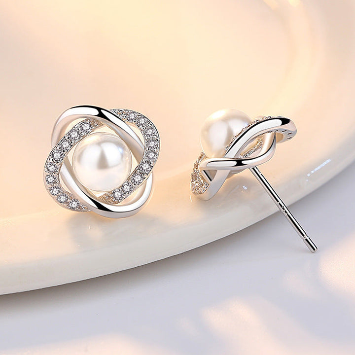 Ladies earrings with artistic pearl design and sparkling zirconia Tom Cottons