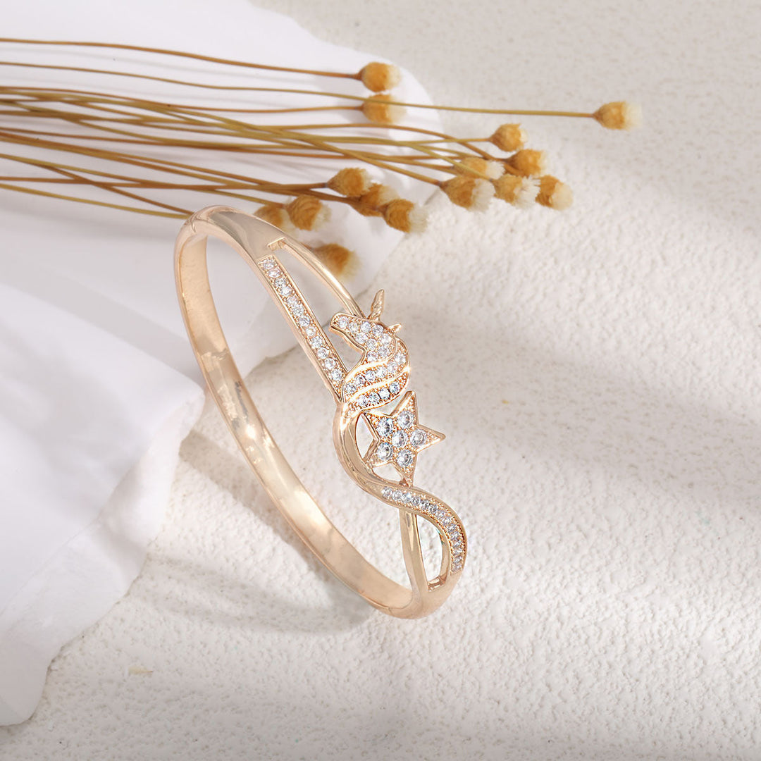 Women's bangle with elegant infinity pattern and sparkling zirconia Tom Cottons