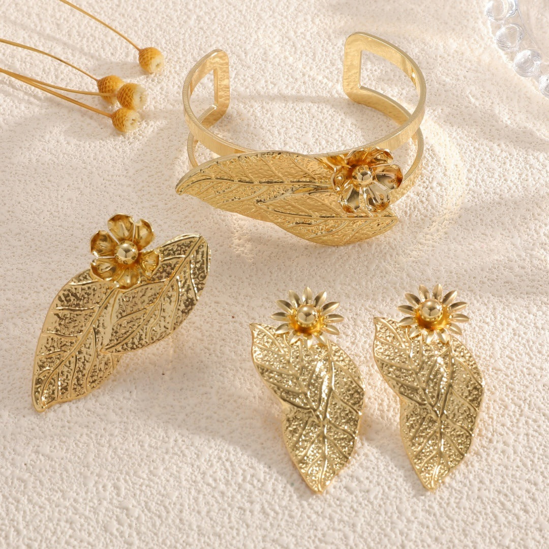 Ladies bangle with elaborate leaf design Tom Cottons