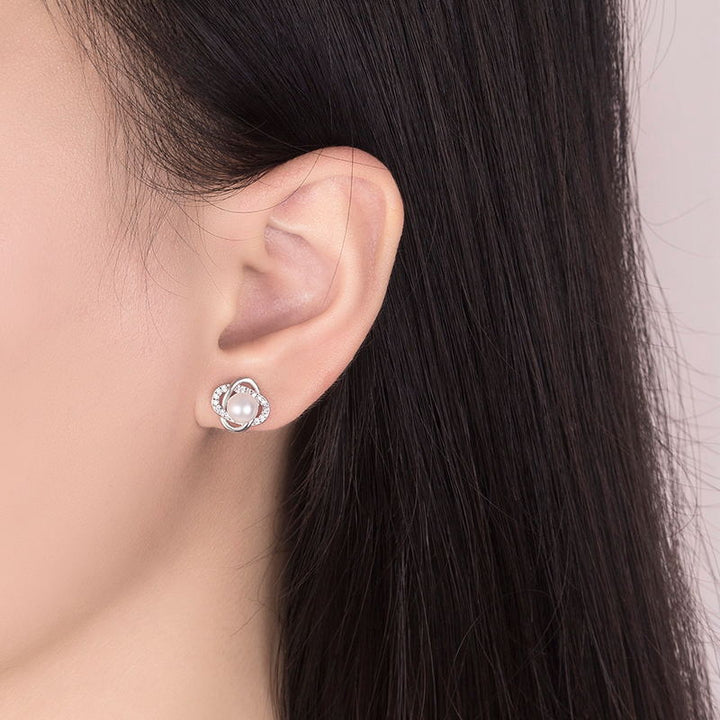 Ladies earrings with artistic pearl design and sparkling zirconia Tom Cottons
