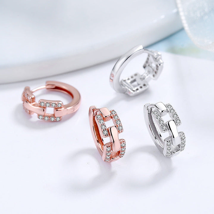 Ladies earrings with sparkling zirconia and modern design Tom Cottons