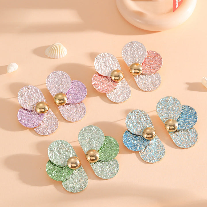Women's ear clips in elaborate floral pattern Tom Cottons