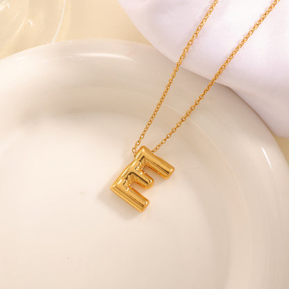 Women's necklace with curved letter pendant Tom Cottons