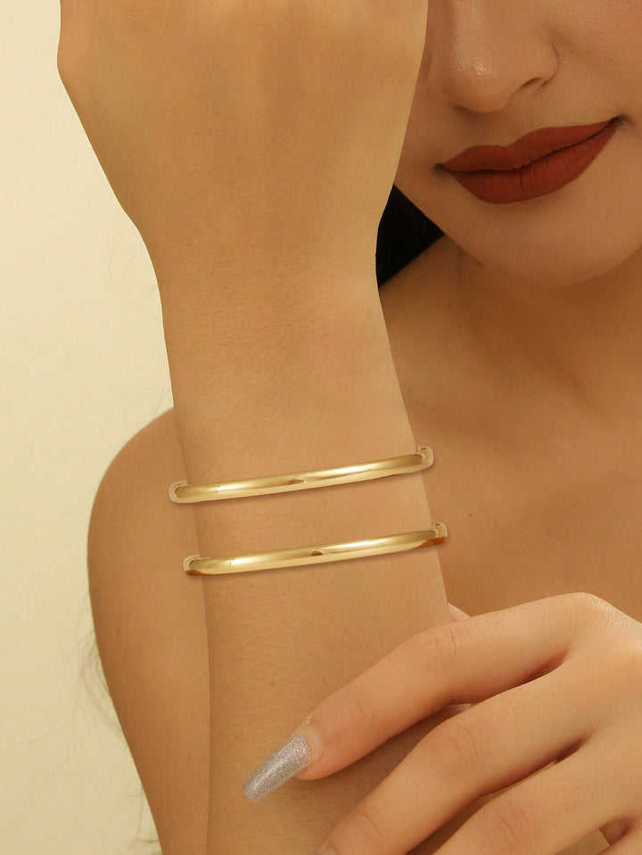 Ladies' bangle with elegant curved design Tom Cottons
