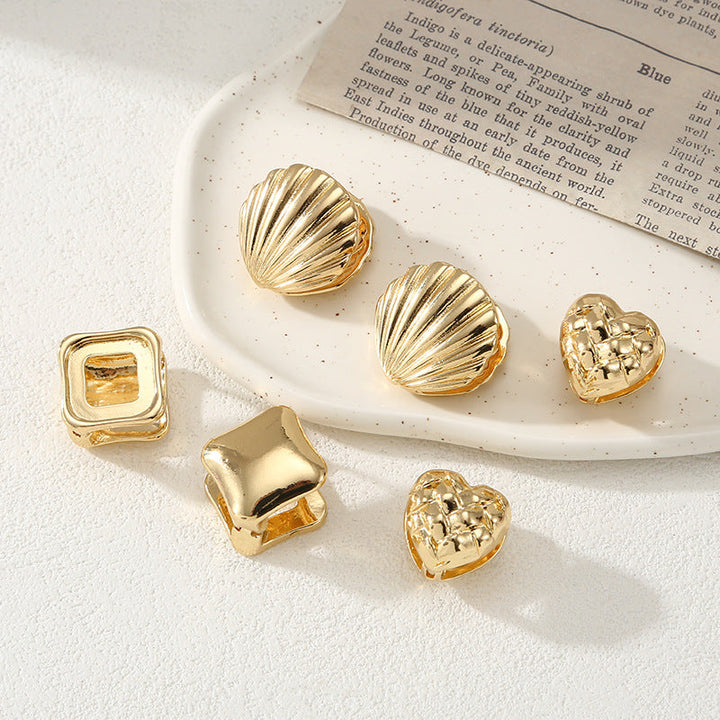Women's ear clips in elegant shell design Tom Cottons
