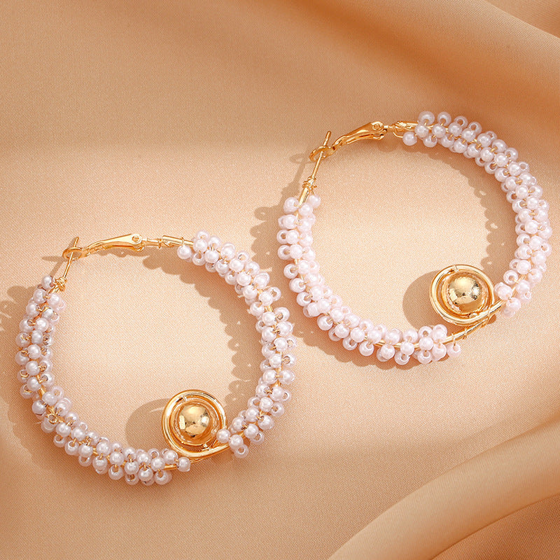 Women’s hoops with artistic pearl design Tom Cottons