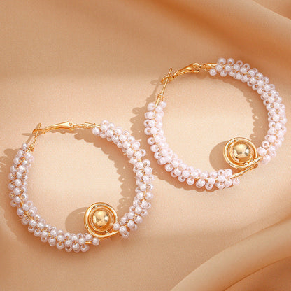 Women’s hoops with artistic pearl design Tom Cottons