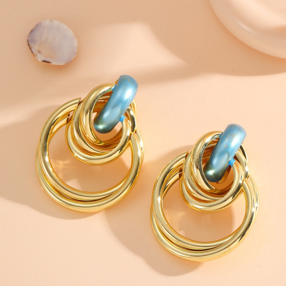 Women's Hanging Earrings with Elegant, Sculptural Design Tom Cottons
