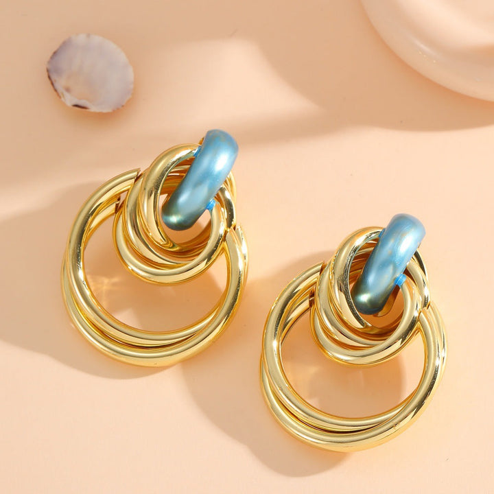 Women's Hanging Earrings with Elegant, Sculptural Design Tom Cottons