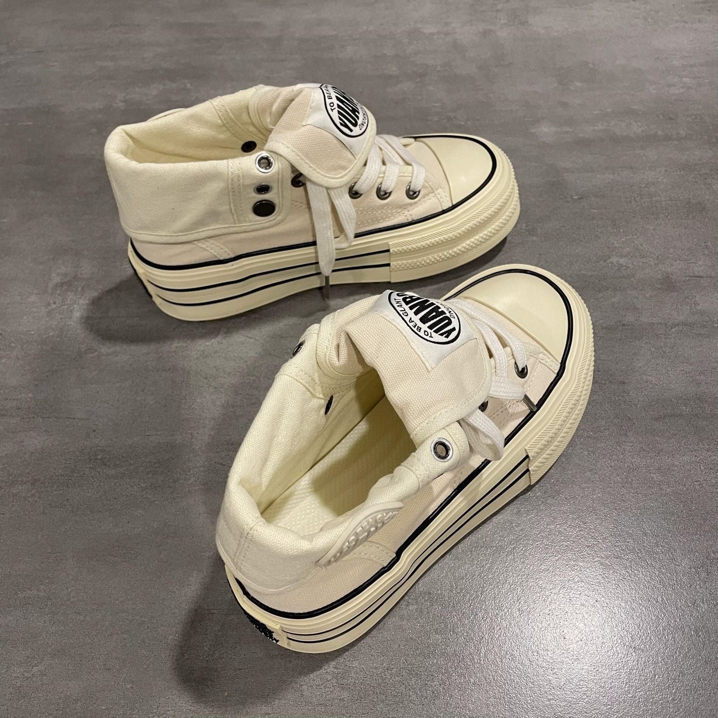 Ladies High-Top Sneakers with fashionable pleated look and durable rubber sole