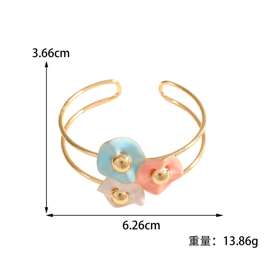 Women's bangle with elaborate floral design Tom Cottons
