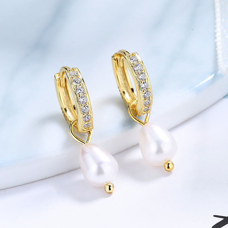 Ladies earrings with elegant zirconia decorations and pearl pendants Tom Cottons