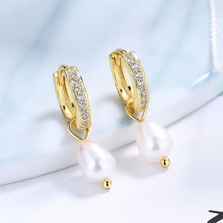 Ladies earrings with elegant zirconia decorations and pearl pendants Tom Cottons