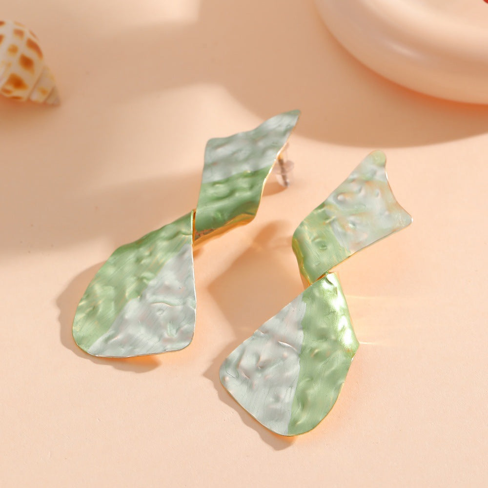Ladies earrings in modern disc design Tom Cottons