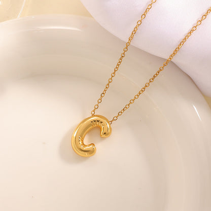 Women's necklace with curved letter pendant Tom Cottons