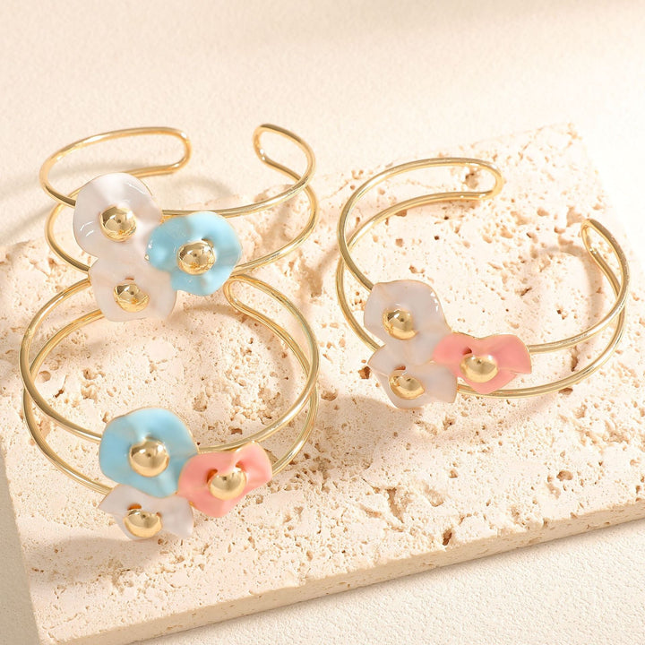 Women's bangle with elaborate floral design Tom Cottons