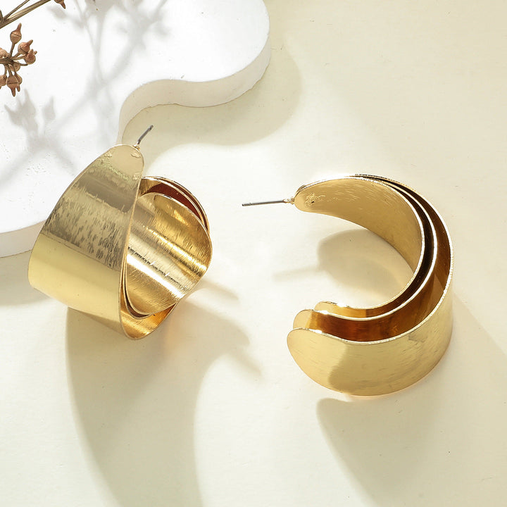 Women's Hanging Earrings in Elegant Wave Pattern Tom Cottons