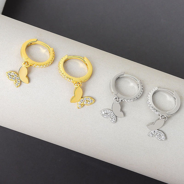 Ladies earrings with elegant butterfly design and sparkling details Tom Cottons