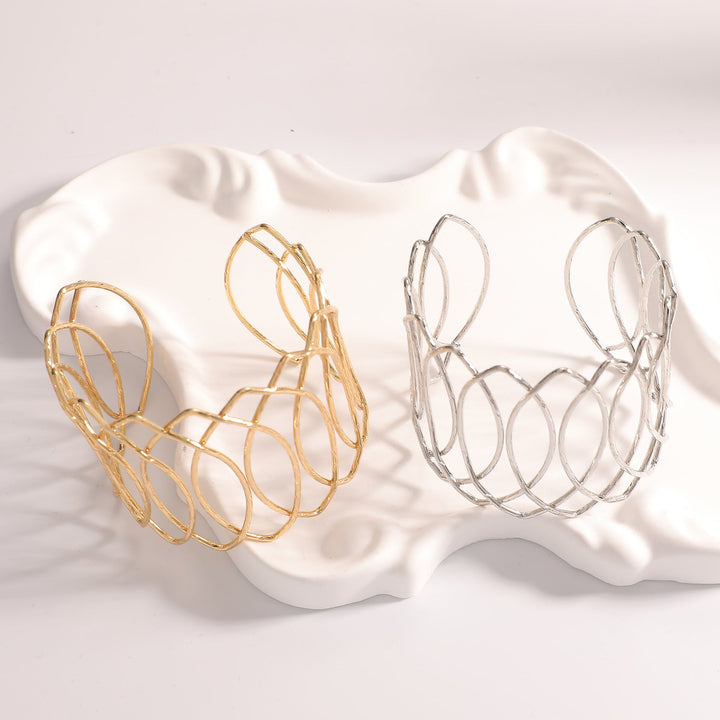 Women Open Bangle with Artfully Curved Design Tom Cottons